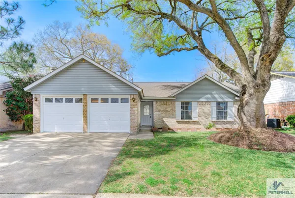 a view of a house with a big yard