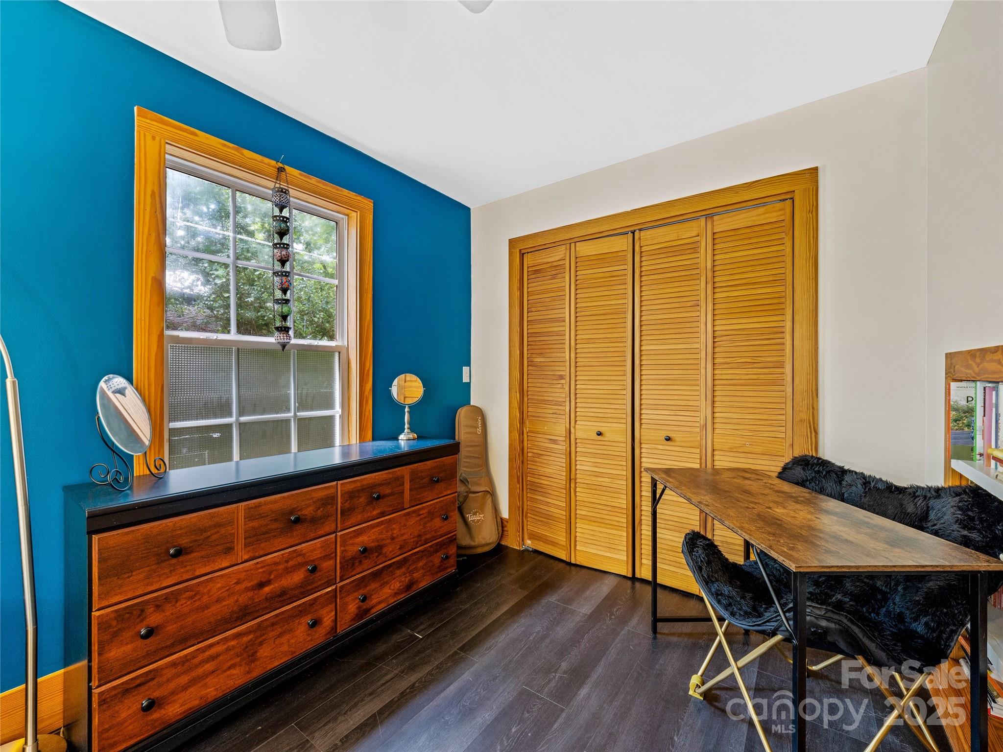 11 Pinewood Road Asheville, NC 28805 - Photo 15 of 31 a room with furniture and a window