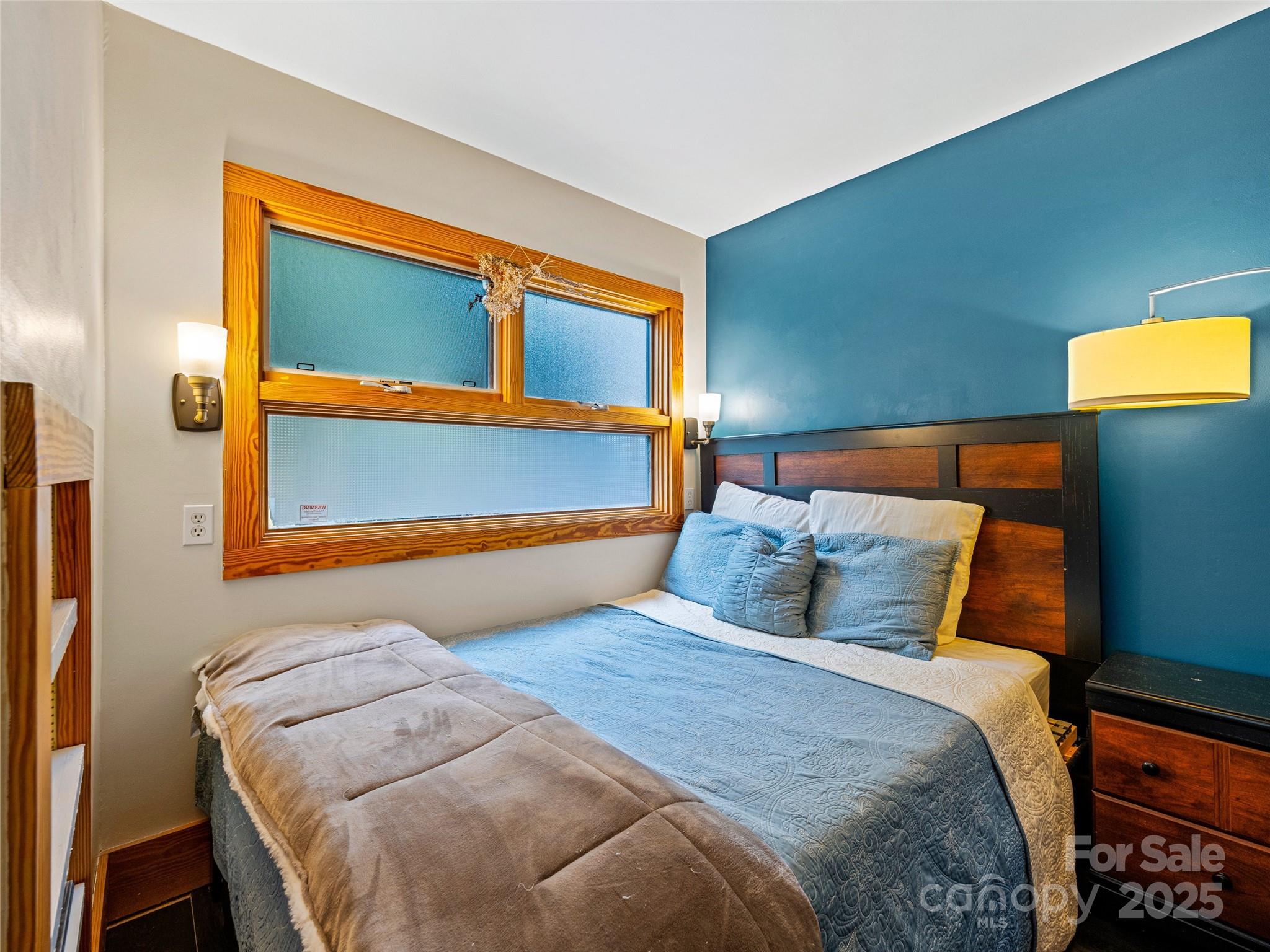 11 Pinewood Road Asheville, NC 28805 - Photo 16 of 31 a bedroom with a bed and window