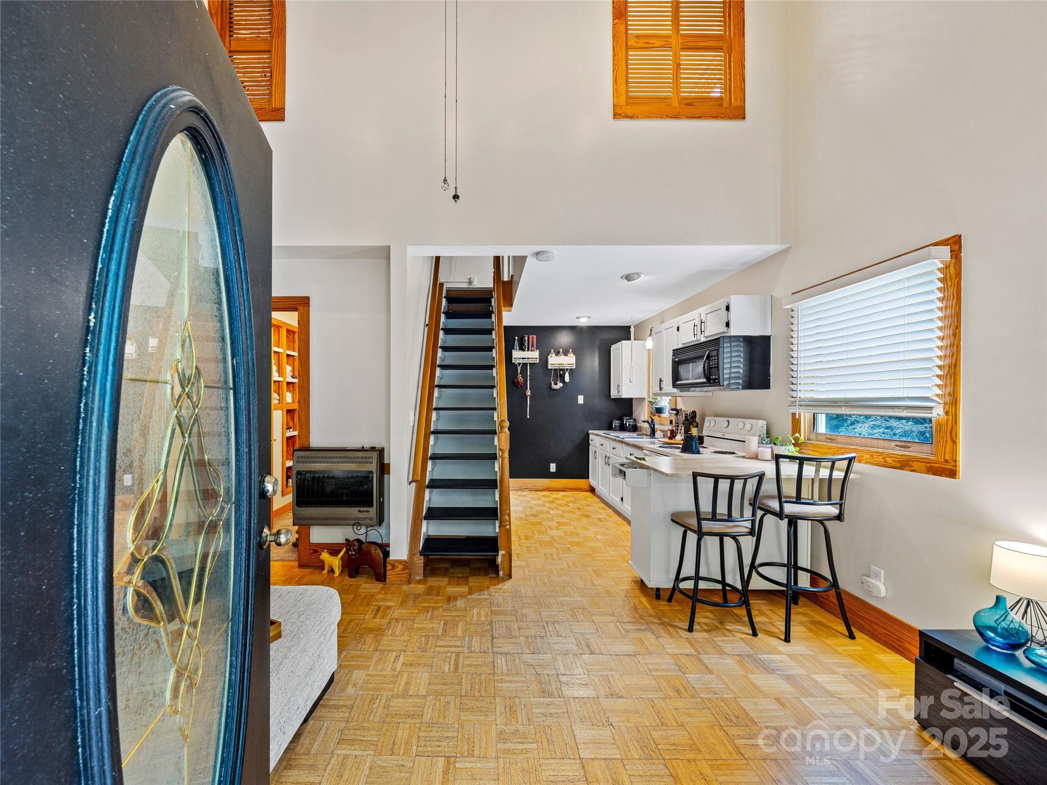 11 Pinewood Road Asheville, NC 28805 - Photo 5 of 31 a view of a livingroom with furniture and a kitchen
