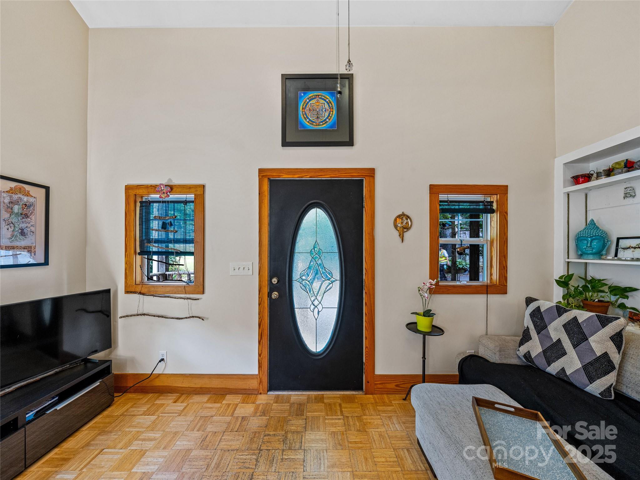 11 Pinewood Road Asheville, NC 28805 - Photo 6 of 31 a living room with furniture a flat screen tv and a window