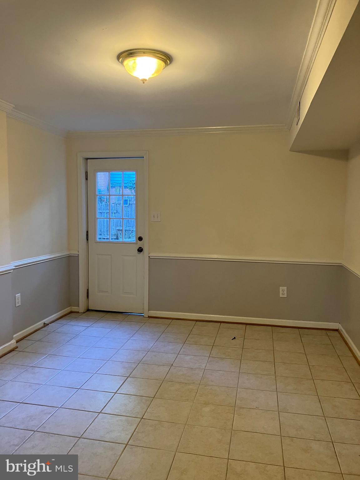 10316 Royal Road Silver Spring, MD 20903 - Photo 14 of 46 an empty room with a empty space and windows