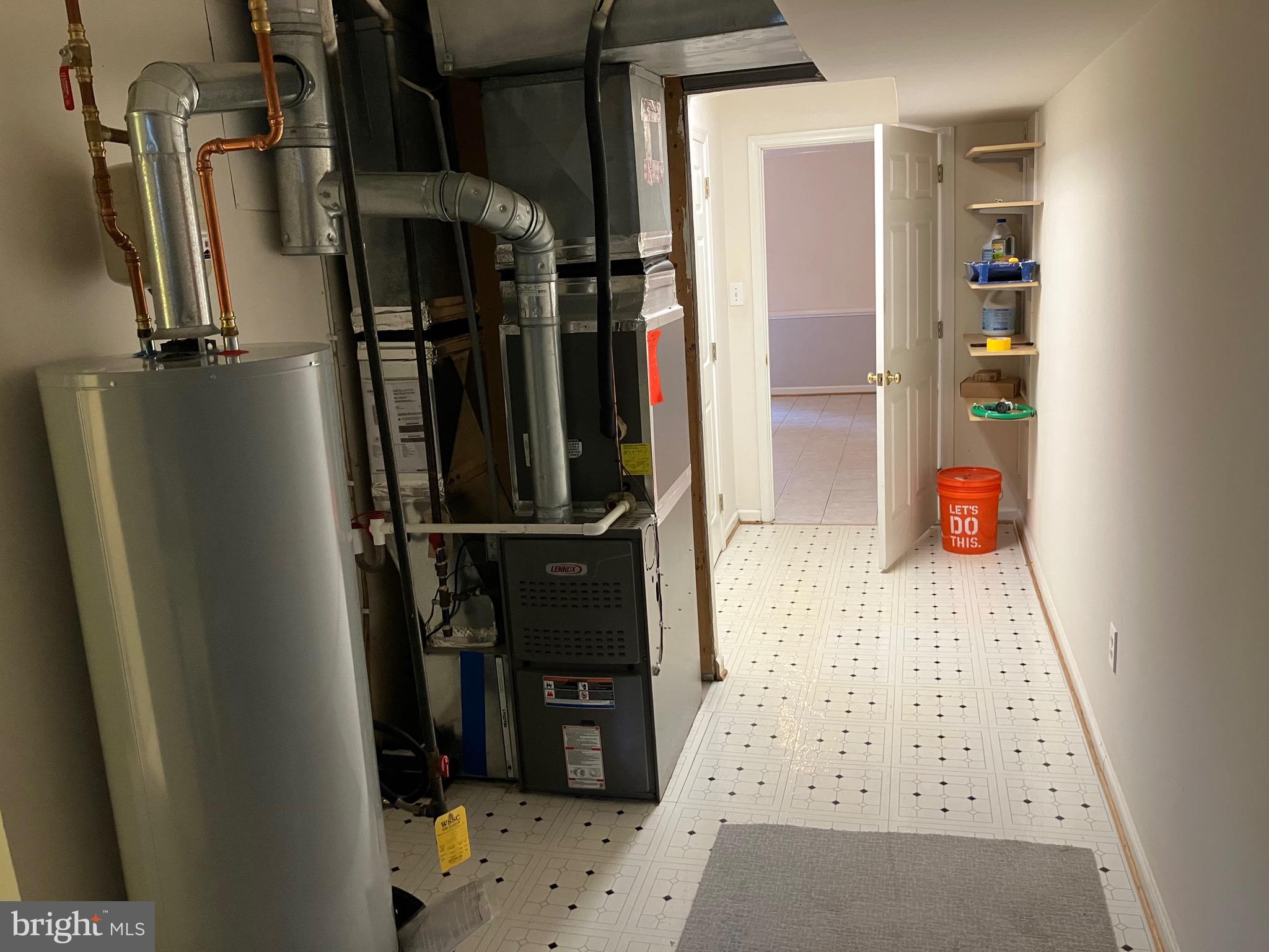 10316 Royal Road Silver Spring, MD 20903 - Photo 22 of 46 a view of walk in closet with clothes and shoes