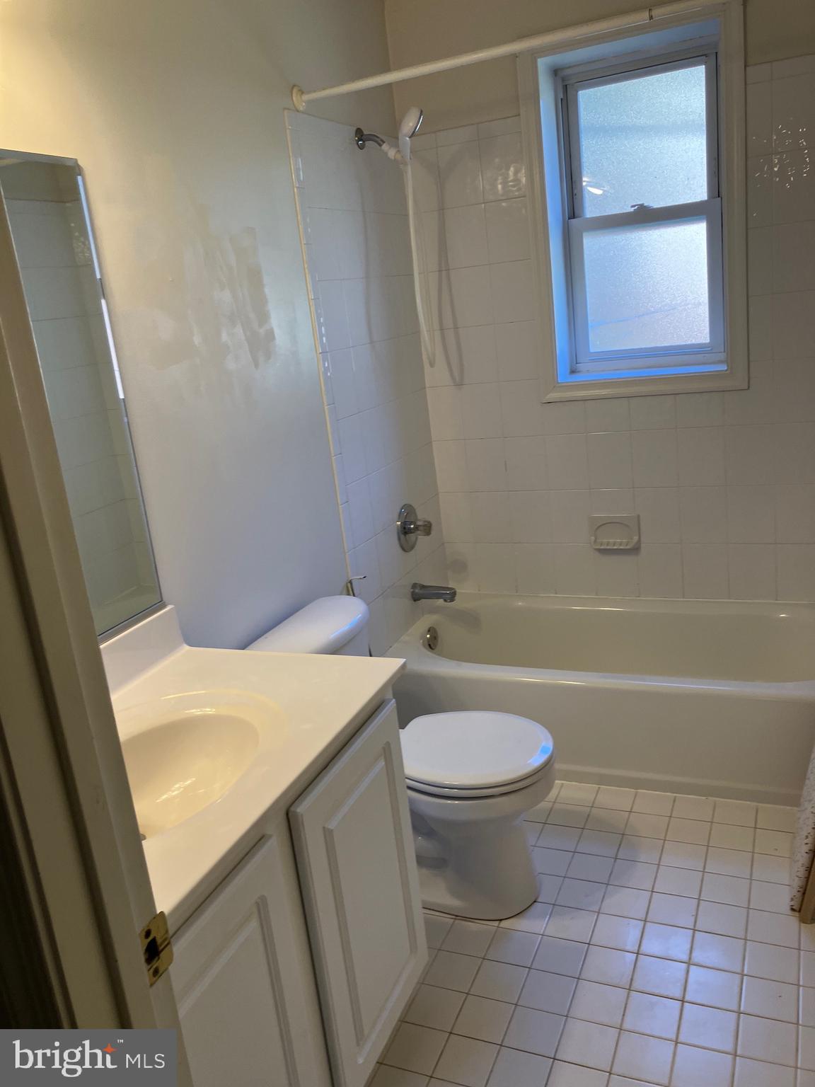 10316 Royal Road Silver Spring, MD 20903 - Photo 39 of 46 a bathroom with a sink a toilet and shower