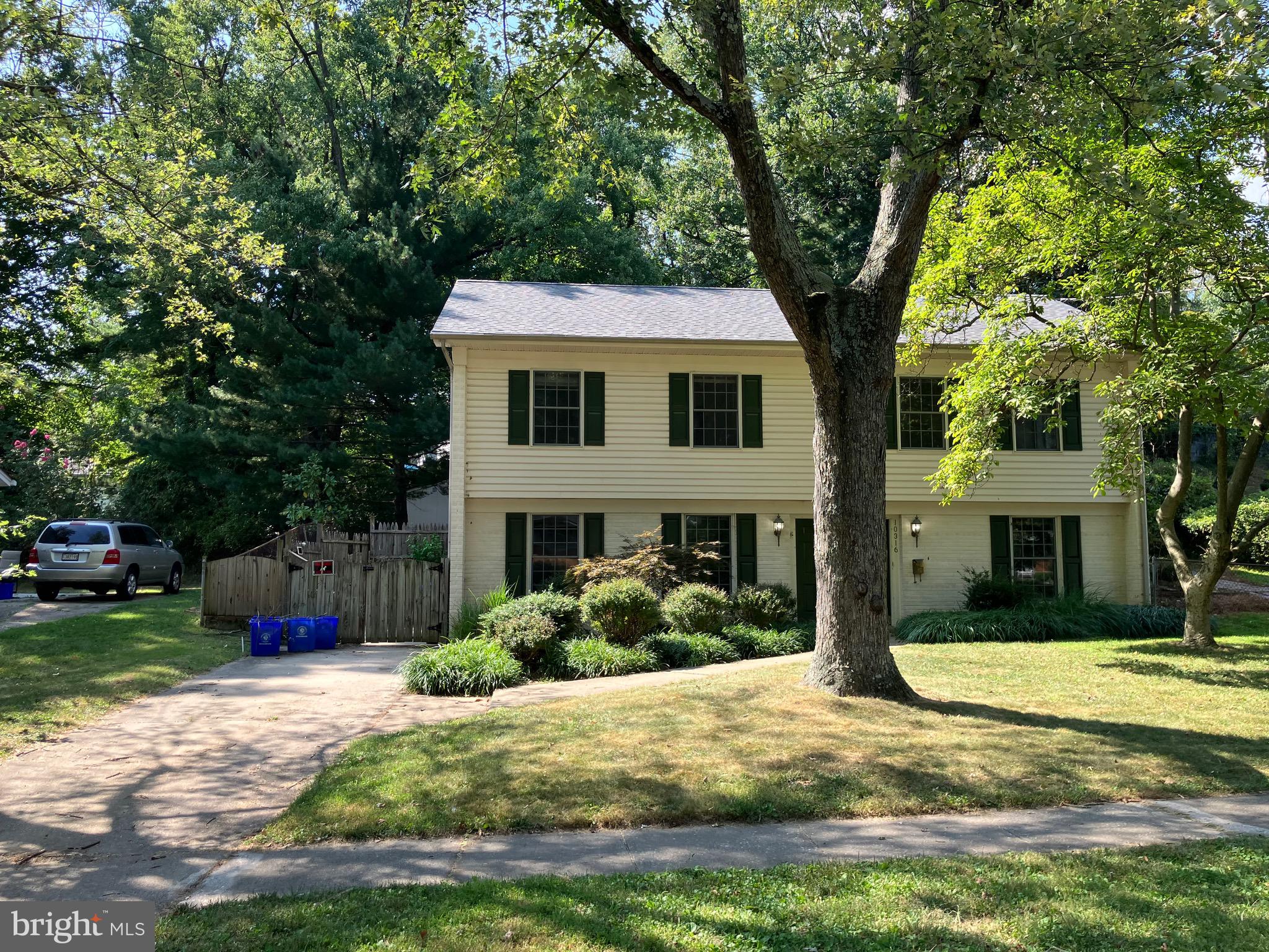 10316 Royal Road Silver Spring, MD 20903 - Photo 46 of 46 a front view of a house with a yard and garage