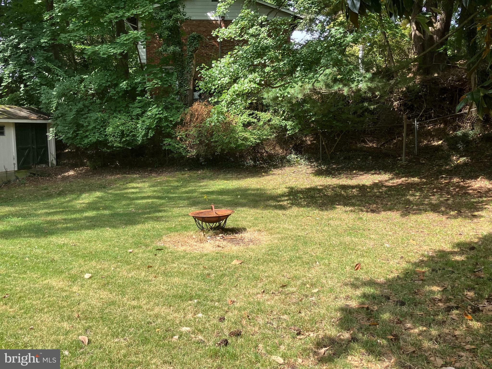 10316 Royal Road Silver Spring, MD 20903 - Photo 7 of 46 a backyard of a house with lots of green space
