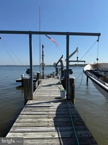 a view of a balcony with two chairs