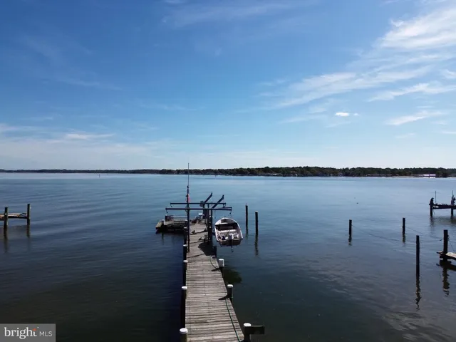 a view of a lake with sitting area