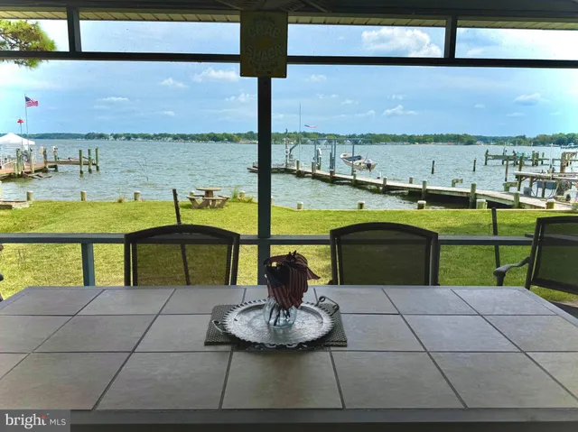 a view of a swimming pool with a chairs