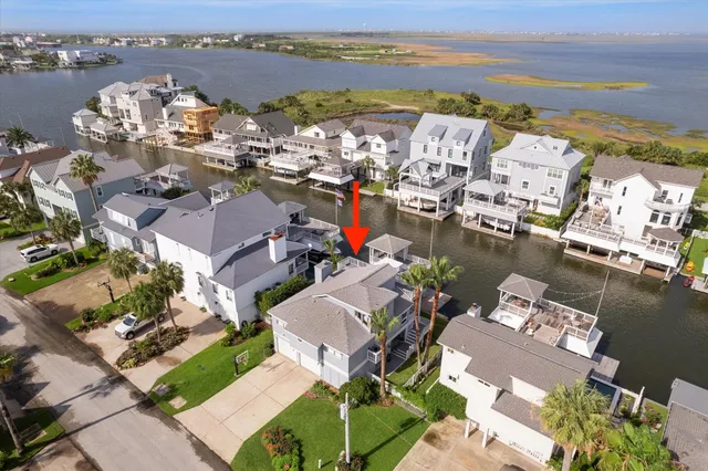 an aerial view of a city with ocean view