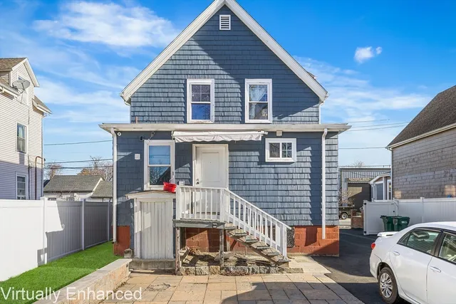a front view of a house with a porch