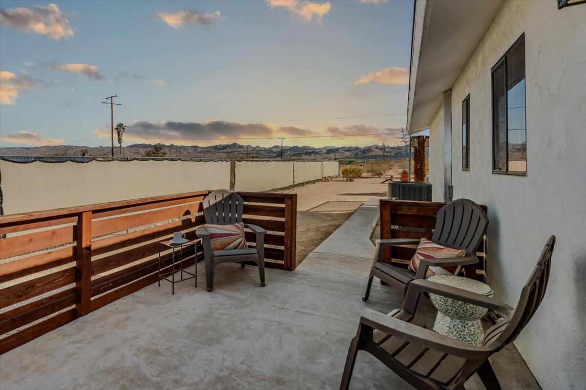 63555 Walpi Drive Joshua Tree, CA 92252 - Photo 19 of 30 a view of a terrace with seating area