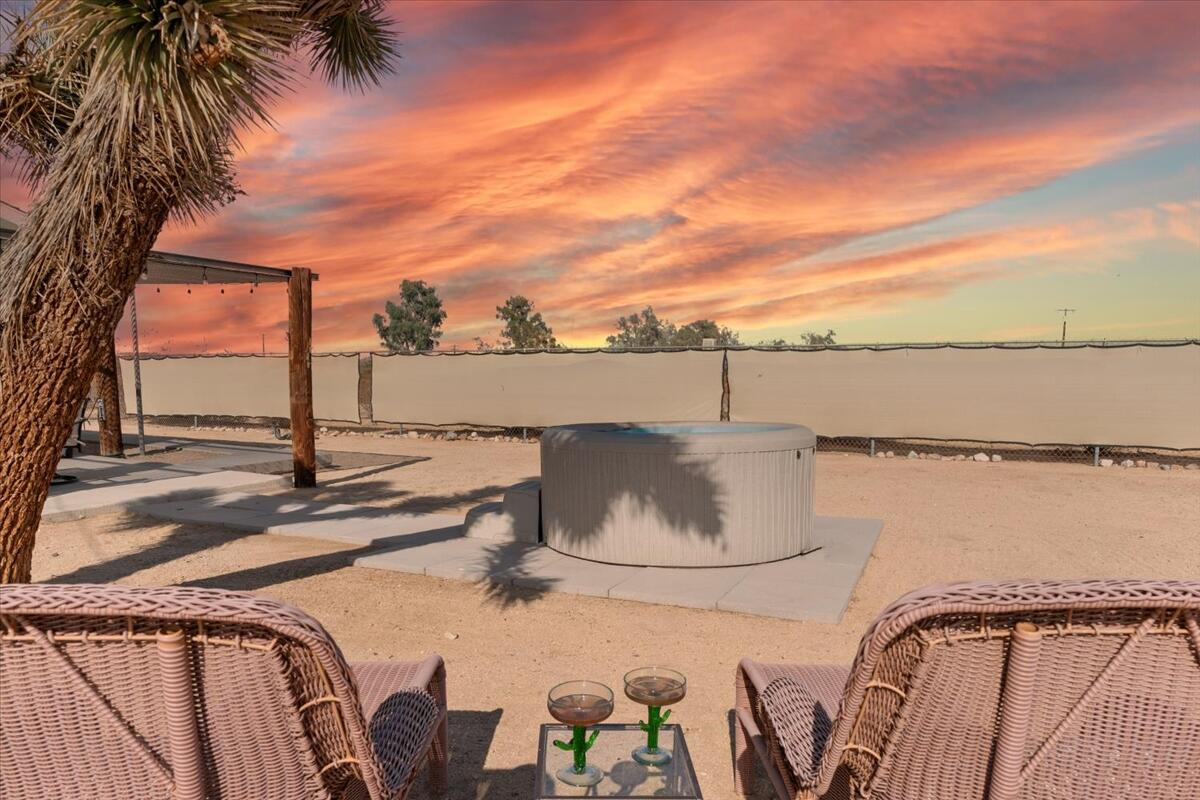 63555 Walpi Drive Joshua Tree, CA 92252 - Photo 25 of 30 a view of a balcony with lake view and a potted plant