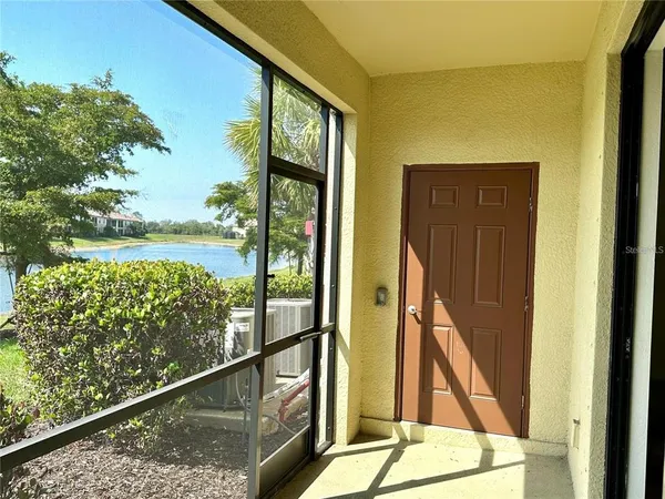 a view of balcony with two flat screen tv