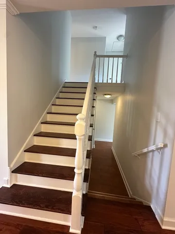 a view of entryway with wooden floor