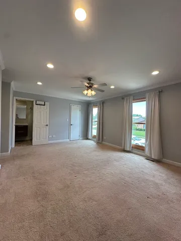 a view of livingroom and a kitchen