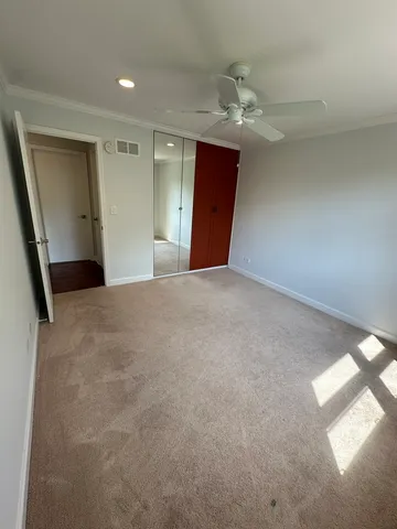 a view of a livingroom with a ceiling fan