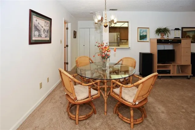 a view of a livingroom with furniture