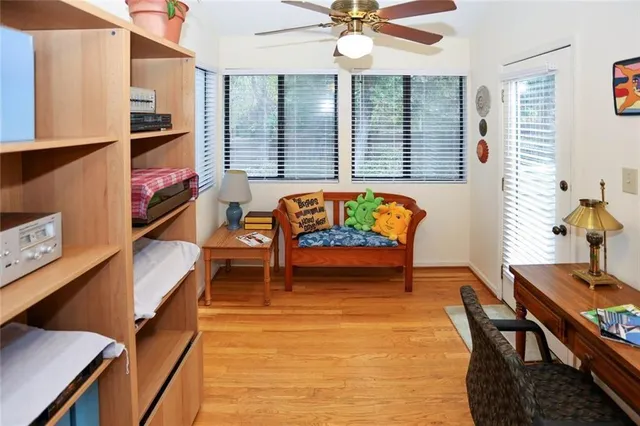 a view of a workspace with furniture