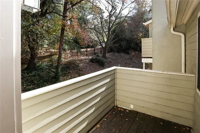 a kitchen with a sink cabinets and a window