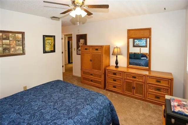 a bed room with a bed and a couch