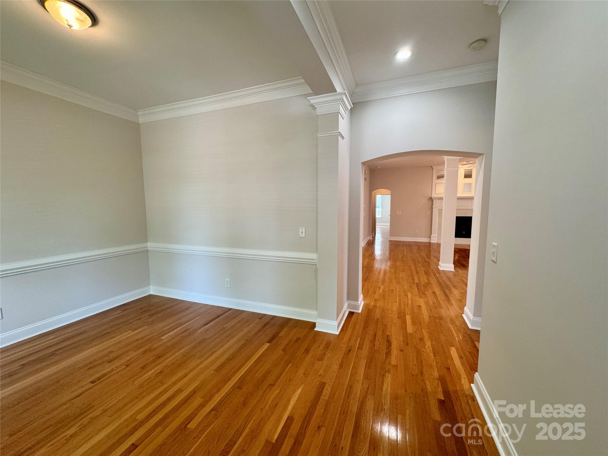 5340 Soaring Eagle Lane Mint Hill, NC 28227 - Photo 5 of 28 a view of a hallway with wooden floor