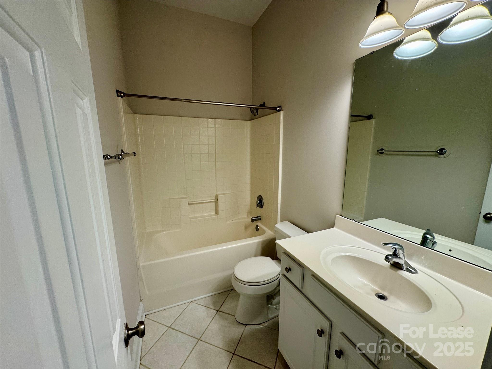 5340 Soaring Eagle Lane Mint Hill, NC 28227 - Photo 8 of 28 a bathroom with a sink toilet tub and shower