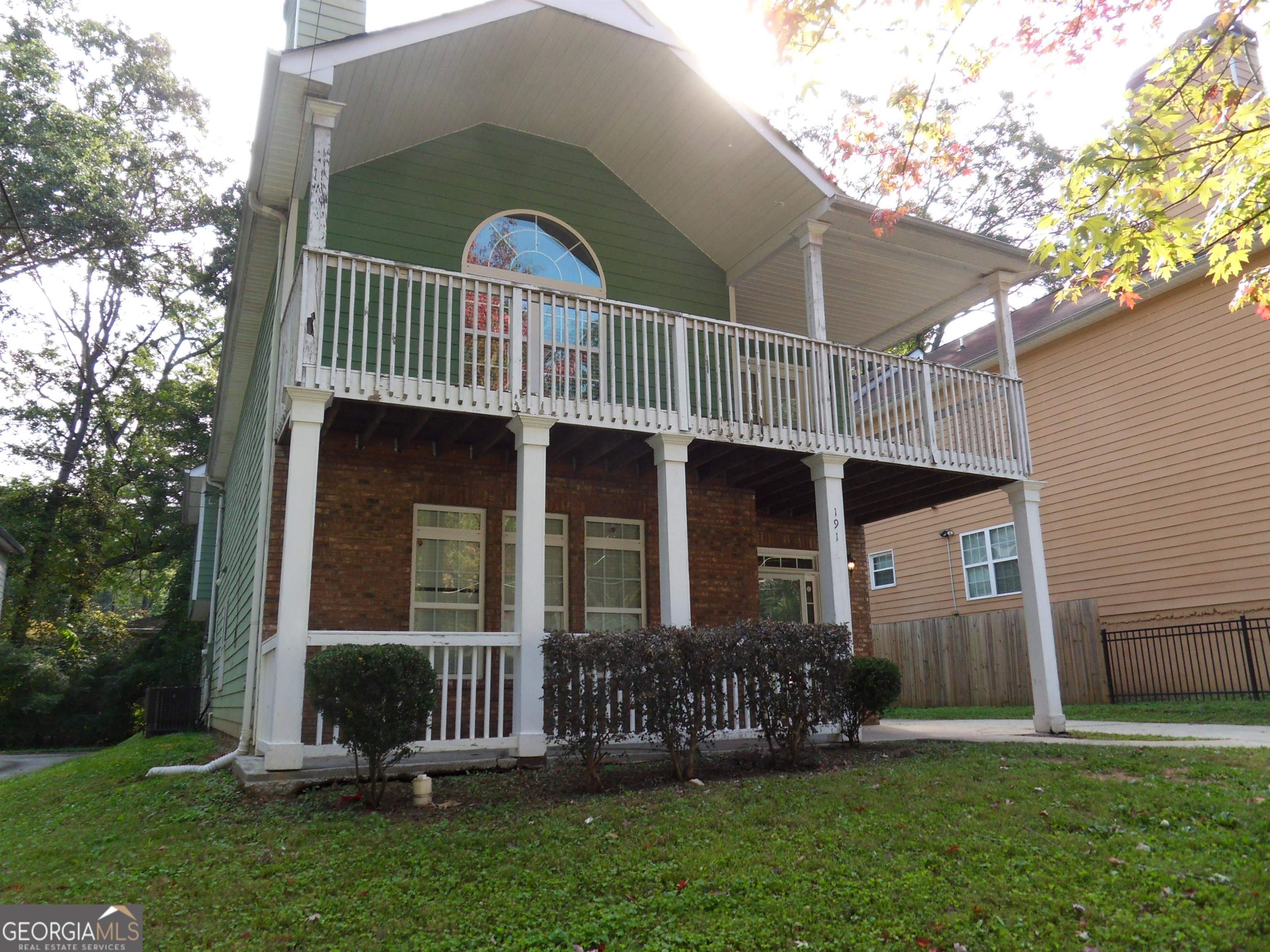 191 Hemphill School Road Northwest Atlanta, GA 30331 - Photo 1 of 1 a front view of a house with a garden