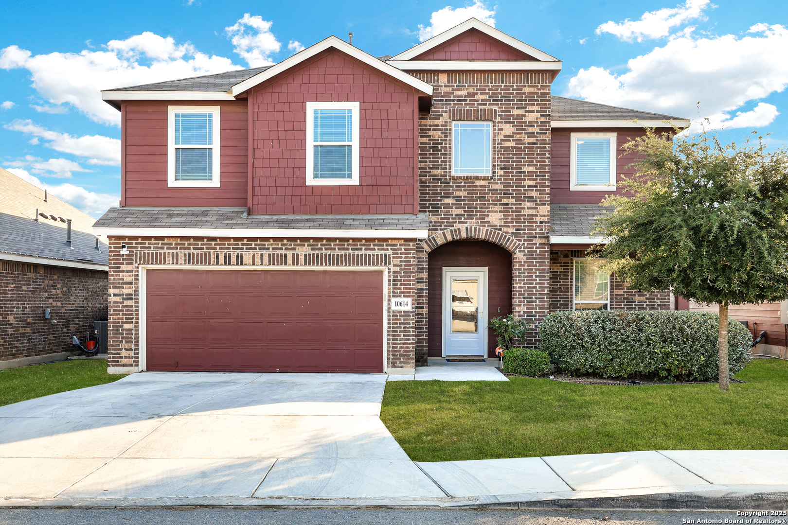10614 Rosalina Loop Converse, TX 78109 - Photo 1 of 31 a front view of a house with a yard and garage