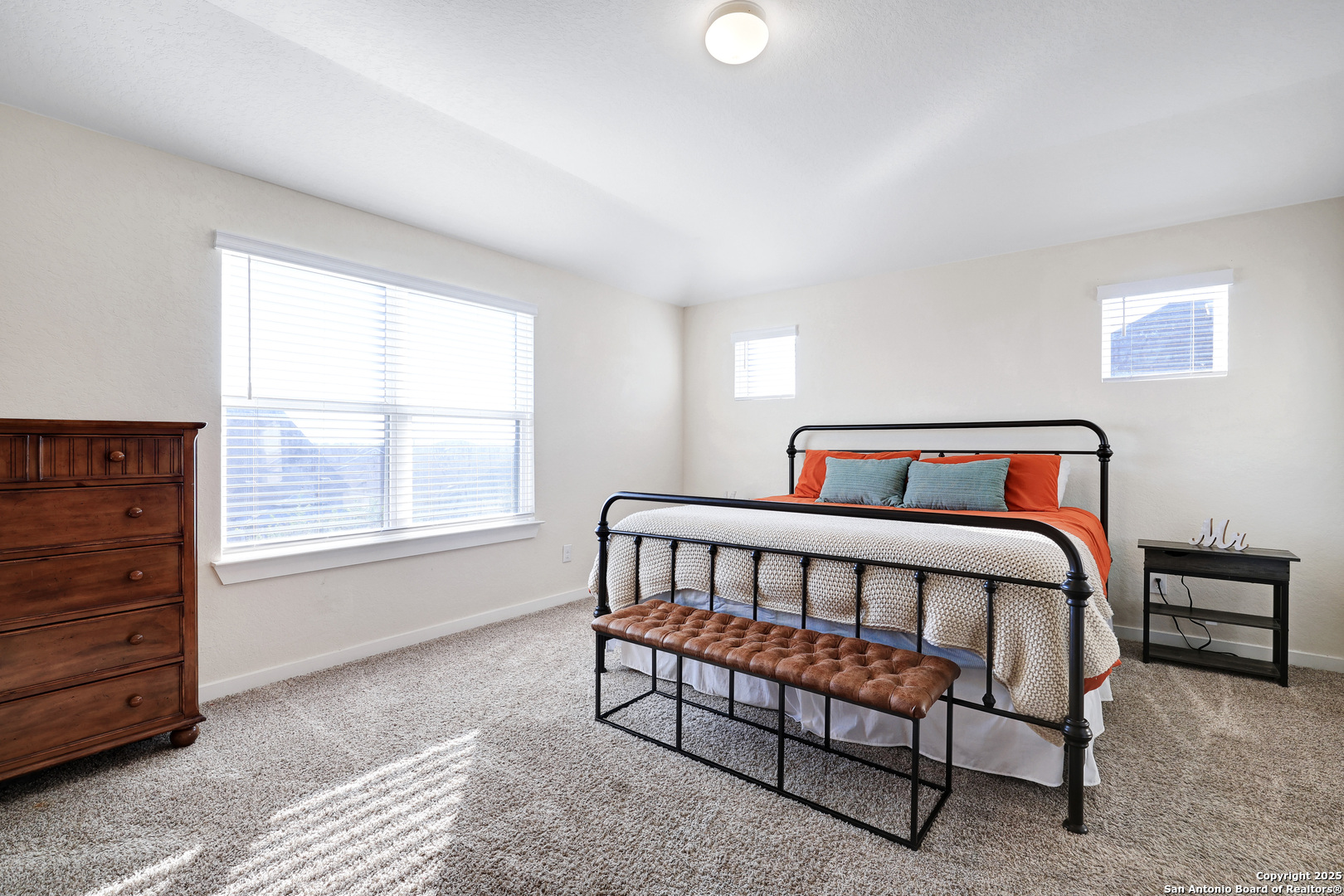10614 Rosalina Loop Converse, TX 78109 - Photo 20 of 31 a bedroom with a bed and a window