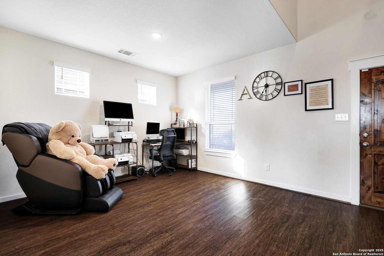 10614 Rosalina Loop Converse, TX 78109 - Photo 3 of 31 a living room with furniture and a flat screen tv
