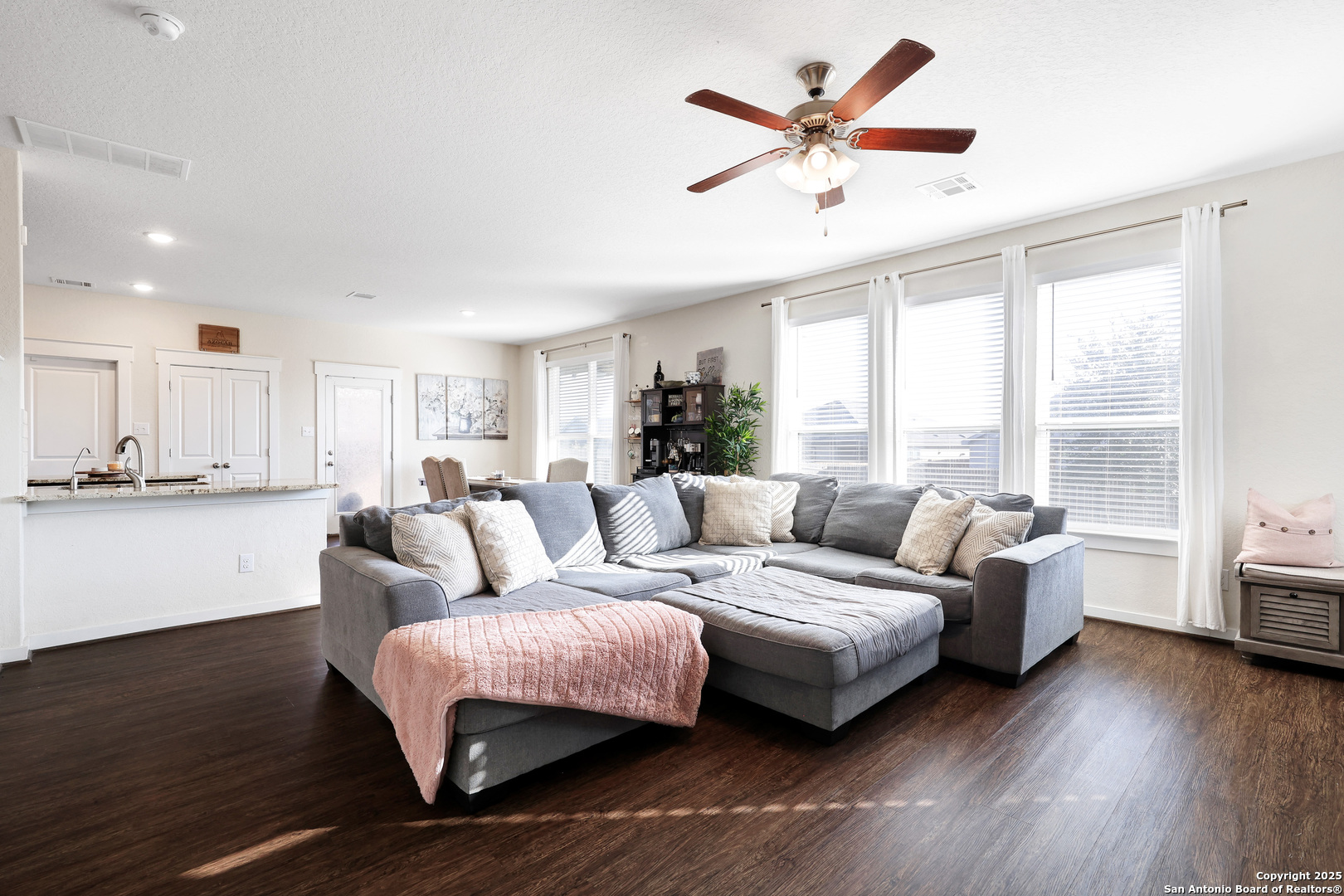 10614 Rosalina Loop Converse, TX 78109 - Photo 5 of 31 a living room with furniture and a large window