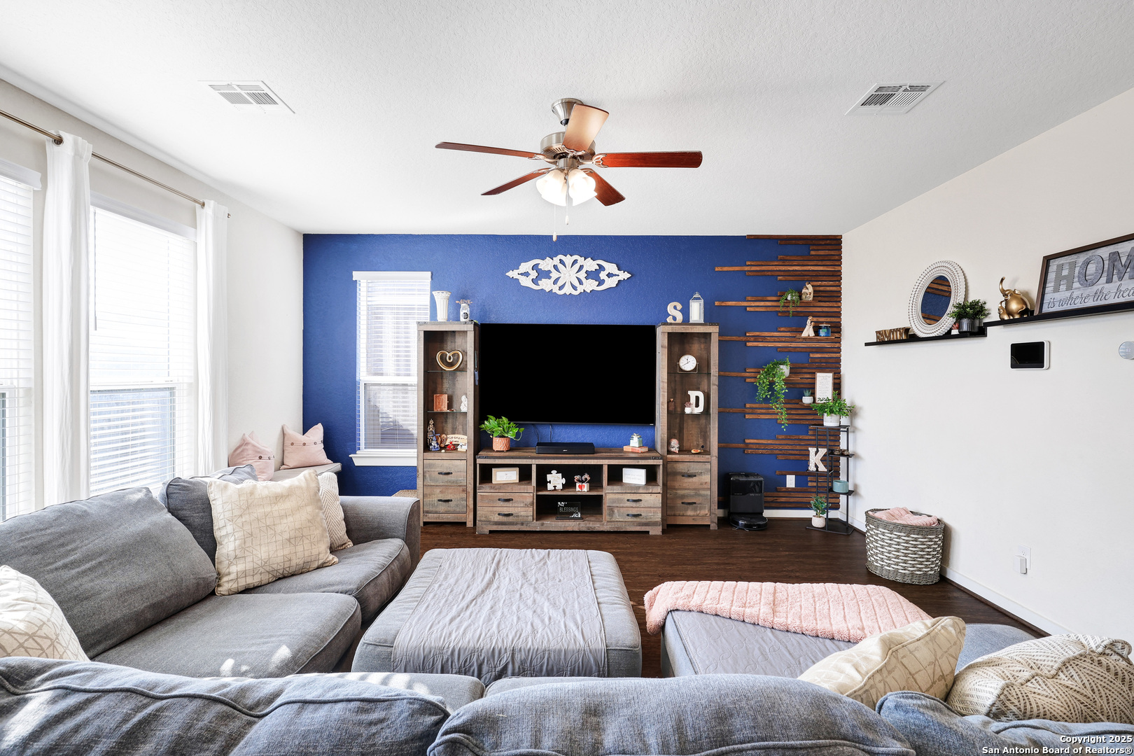 10614 Rosalina Loop Converse, TX 78109 - Photo 7 of 31 a living room with furniture and a flat screen tv