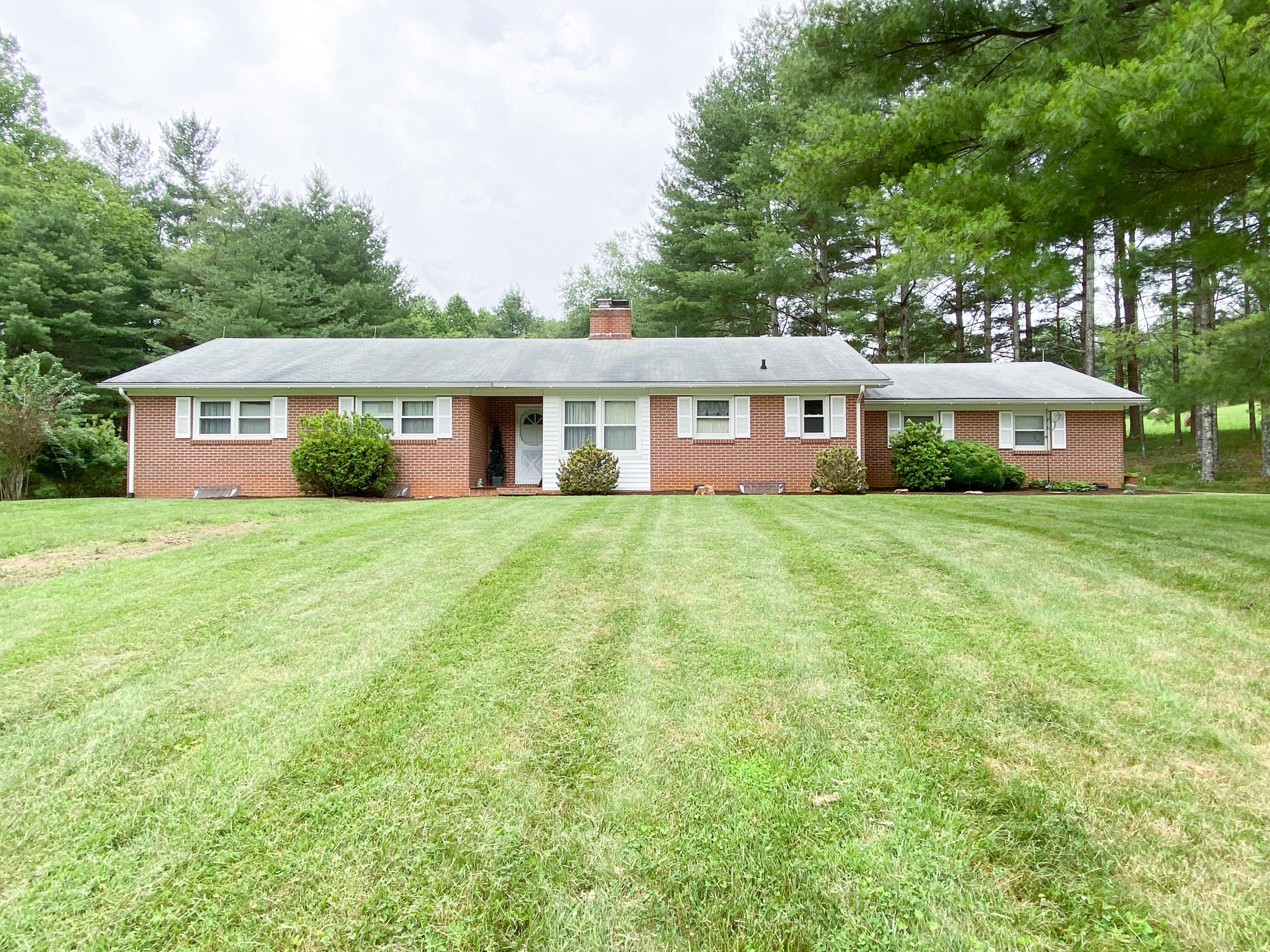 1090 Conner Grove Road Southwest Willis, VA 24380 - Photo 1 of 1 a view of a house with a yard and sitting area