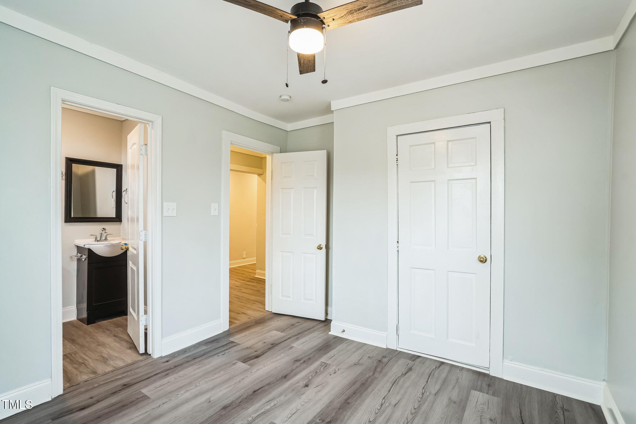 2400 Dorety Place Raleigh, NC 27604 - Photo 12 of 29 wooden floor in an empty room with a window