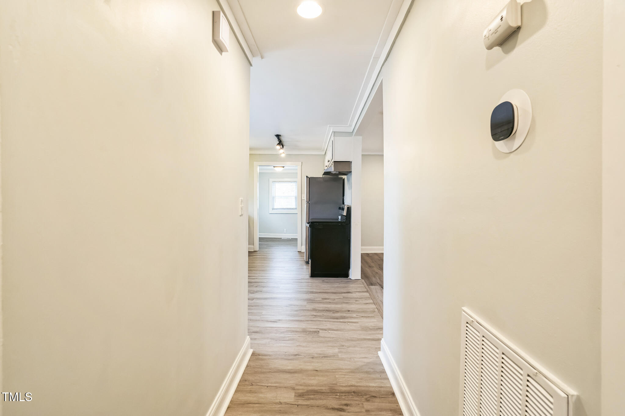 2400 Dorety Place Raleigh, NC 27604 - Photo 27 of 29 a view of a hallway with wooden floor