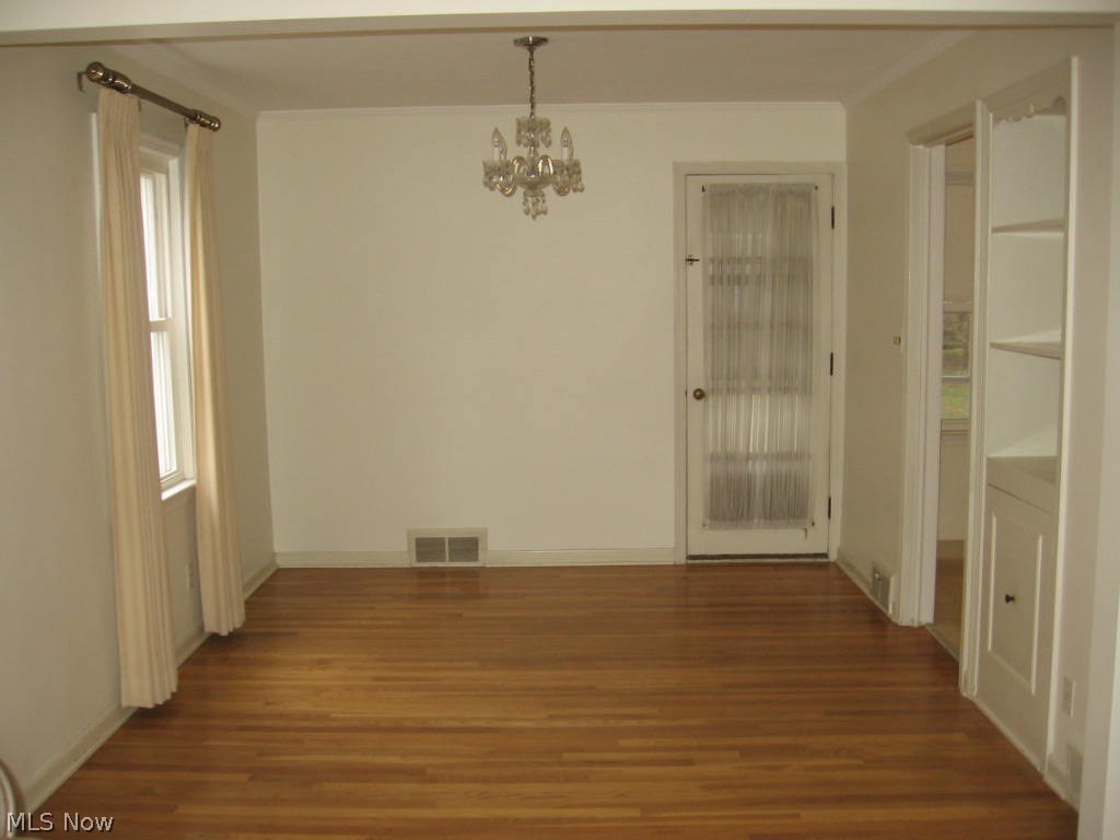 1213 Ford Road Lyndhurst, OH 44124 - Photo 5 of 7 Dinning Room hardwood floors. Door leads to screened in porch