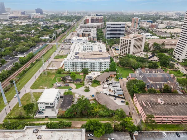 an aerial view of residential building and lake view