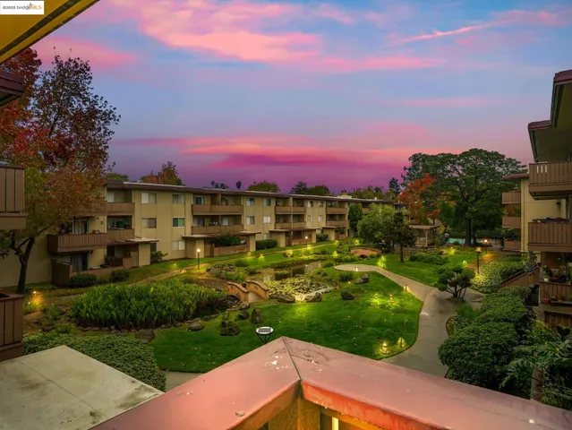 a view of a building with a garden