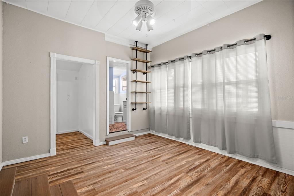 435 3rd Street Northwest Largo, FL 33770 - Photo 19 of 35 a view of entryway with wooden floor