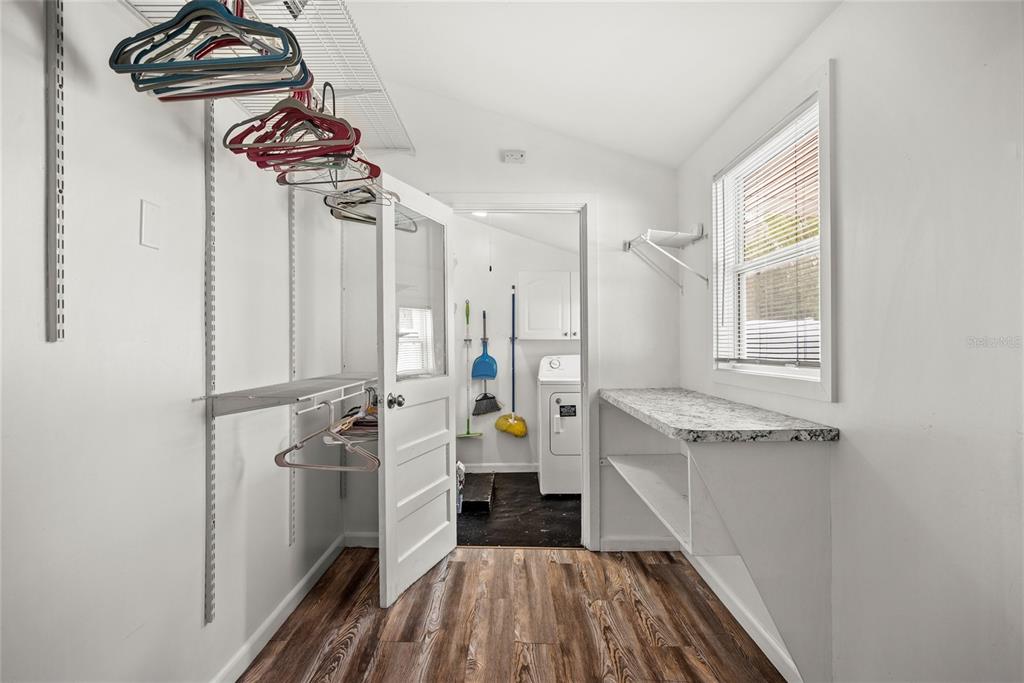 435 3rd Street Northwest Largo, FL 33770 - Photo 22 of 35 a kitchen with a refrigerator and a stove
