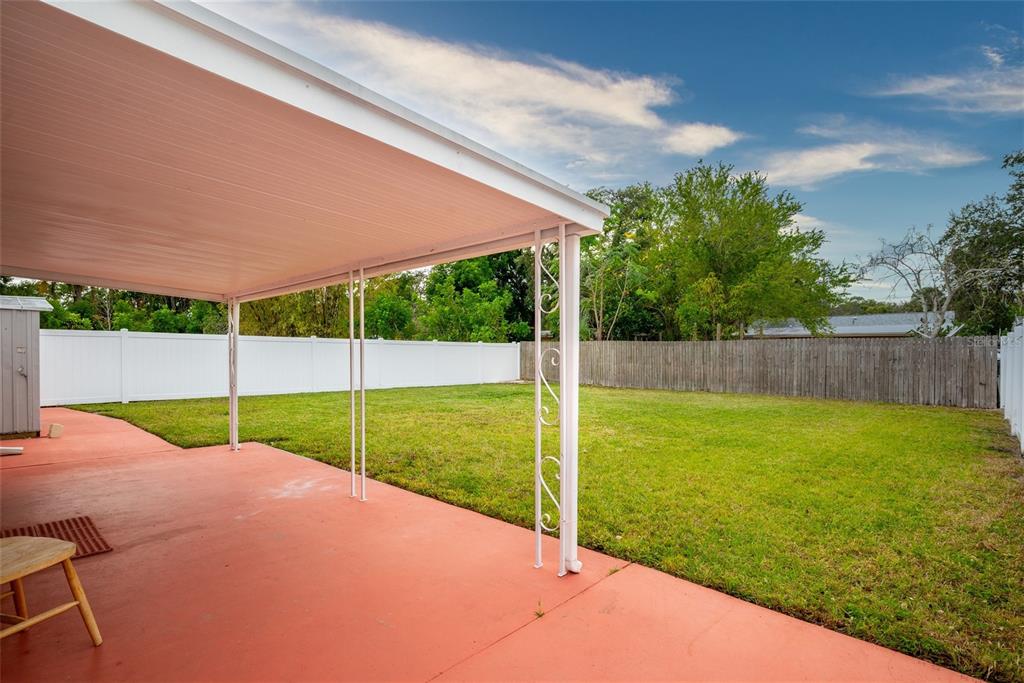 435 3rd Street Northwest Largo, FL 33770 - Photo 25 of 35 a view of a backyard with a garden and plants