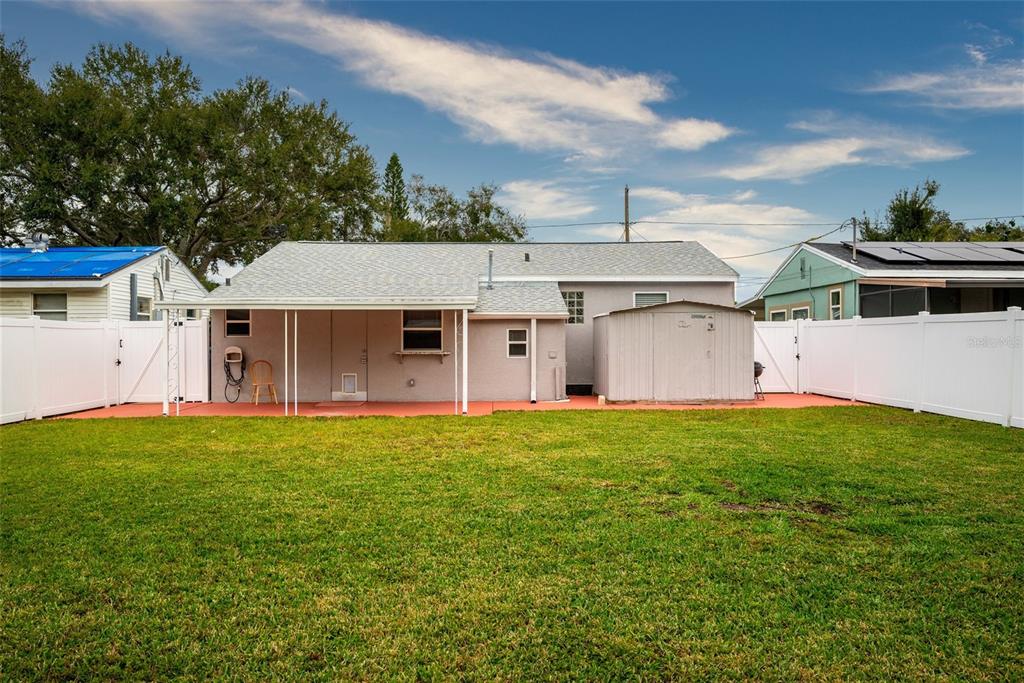 435 3rd Street Northwest Largo, FL 33770 - Photo 27 of 35 front view of a house with a yard