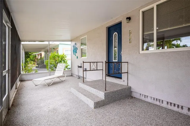 a view of an entryway with a front door