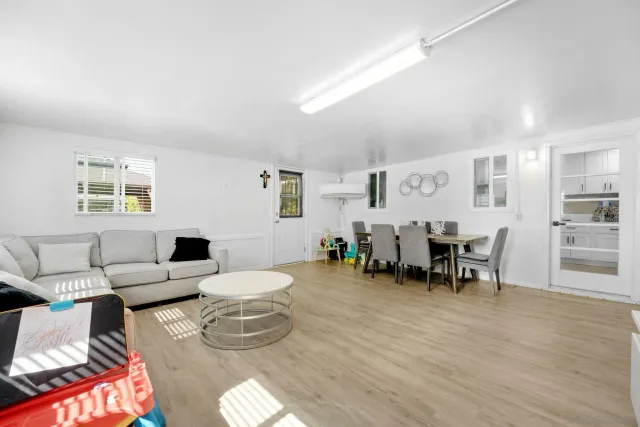 a living room with furniture and a table