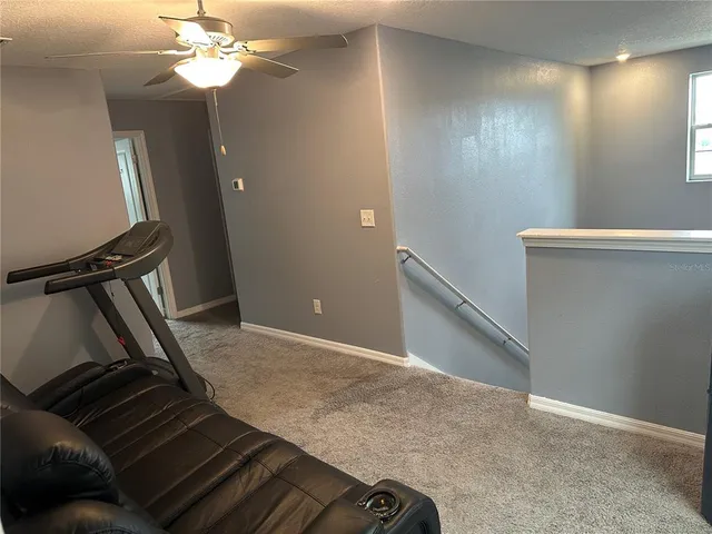 a view of a room with staircase