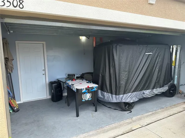 a view of two chairs in the room