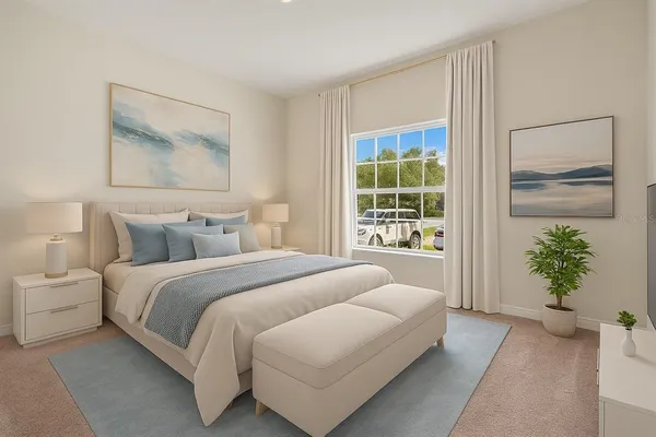 a bedroom with a balcony a bed and a painting on the wall
