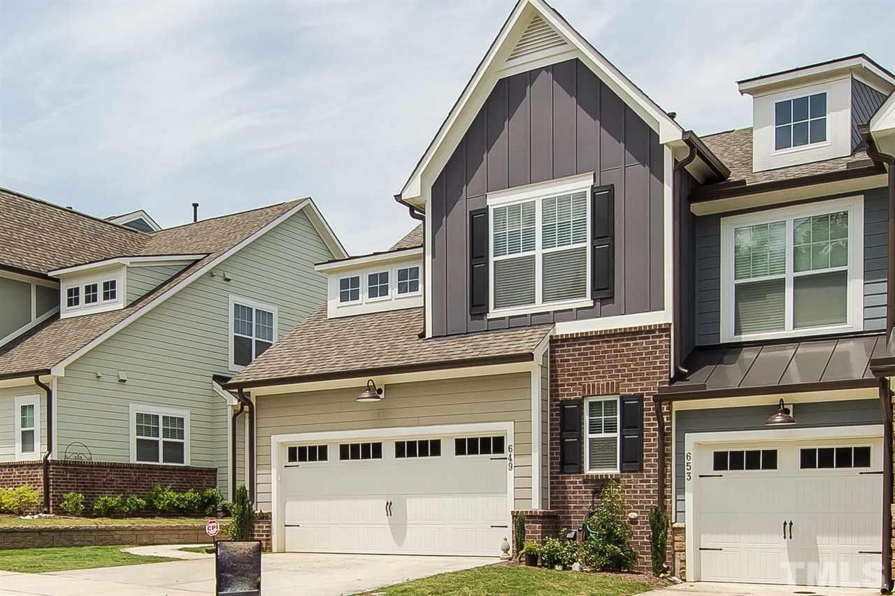 649 Fallon Grove Way Raleigh, NC 27608 - Photo 8 of 22 a view of a house with a window and balcony