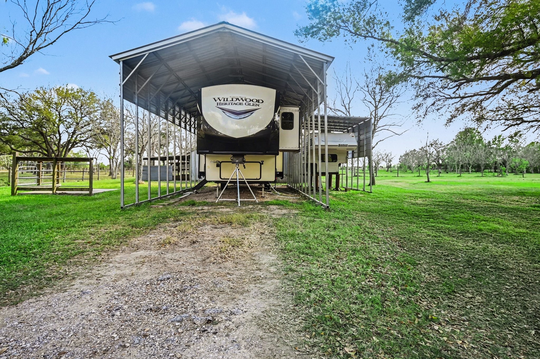 21503 Pecan Bend Road Damon, TX 77430 - Photo 39 of 45 a view of a park with a bench and trees